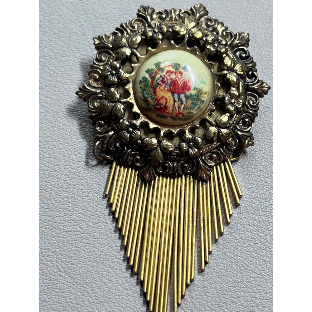 Vintage Coro Gold tone Brooch with Painted Couple and Metal Fringe, 1930's